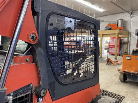 how to remove side widows on a kubota skid steer|kubota window cleaning tips.